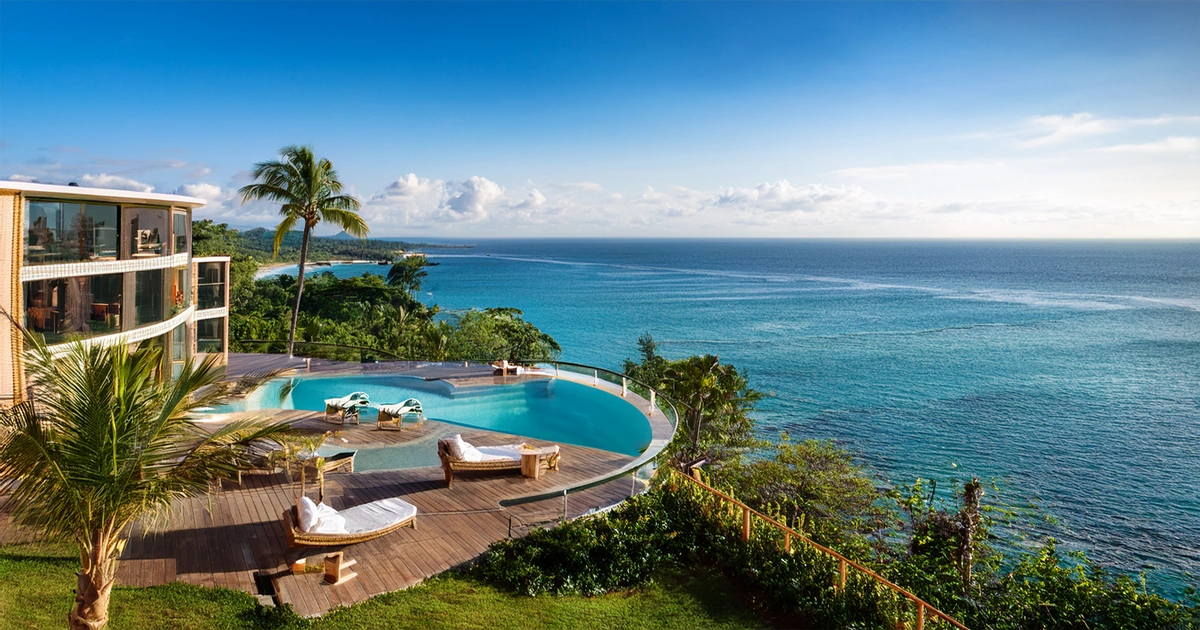 Boutique hotel luxury with ocean views and infinity pool in a tropical setting